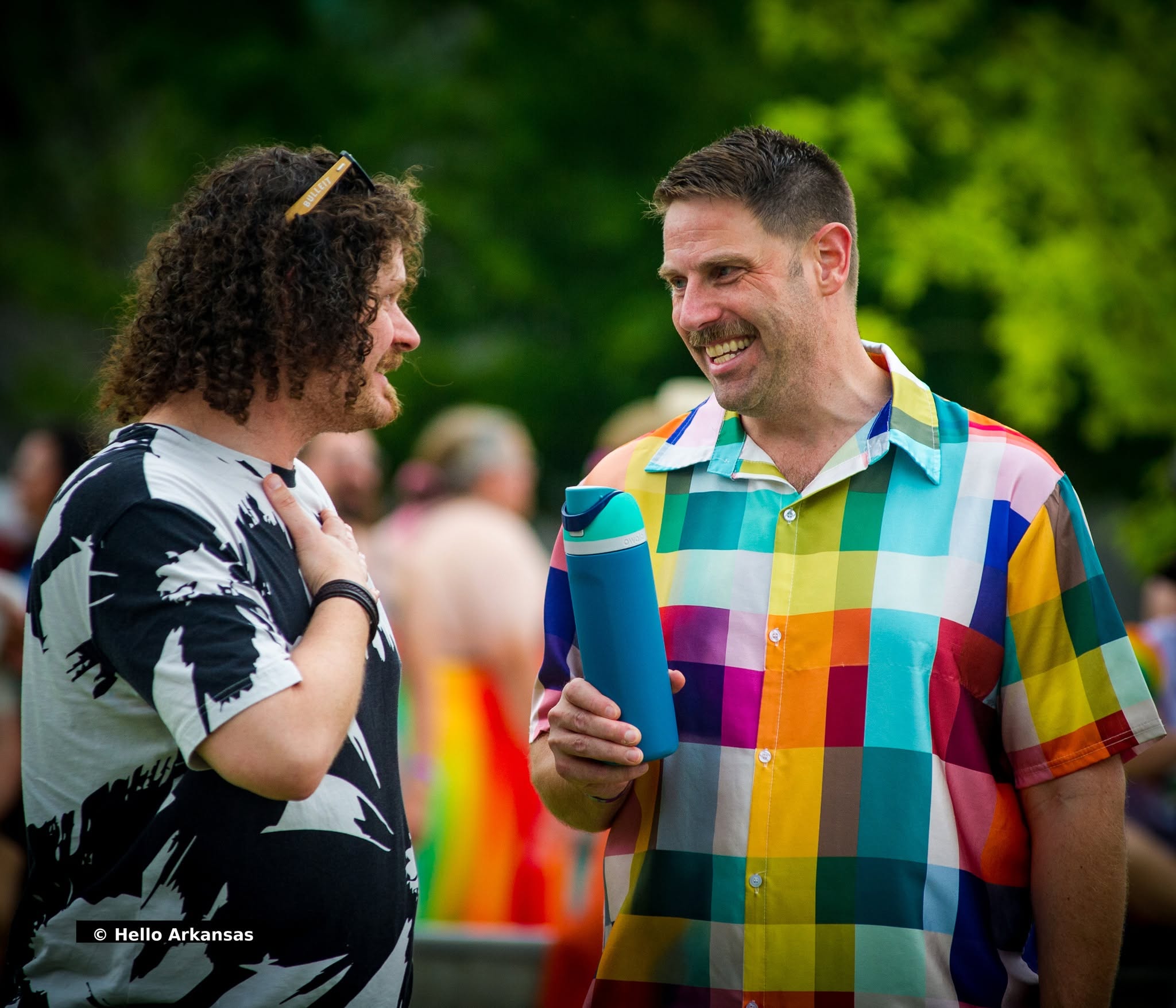 Kyle chatting at NWA Pride — photo by Hello Arkansas